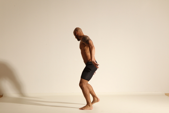 Underwear Man Black Muscular Bald Dancing Dynamic poses Academic