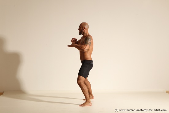 Underwear Man Black Muscular Bald Dancing Dynamic poses Academic