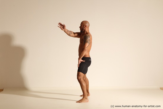 Underwear Man Black Muscular Bald Dancing Dynamic poses Academic