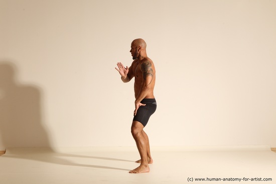 Underwear Man Black Muscular Bald Dancing Dynamic poses Academic