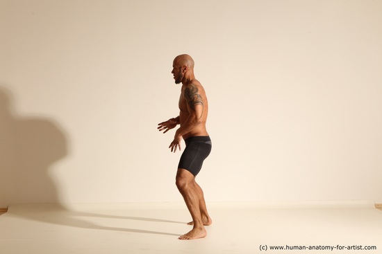 Underwear Man Black Muscular Bald Dancing Dynamic poses Academic