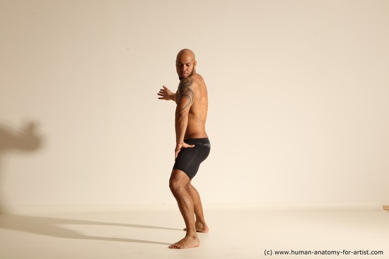 Underwear Man Black Muscular Bald Dancing Dynamic poses Academic