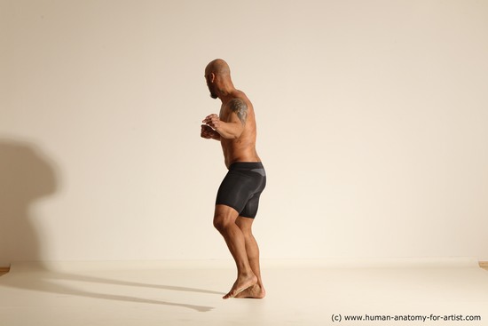 Underwear Man Black Muscular Bald Dancing Dynamic poses Academic