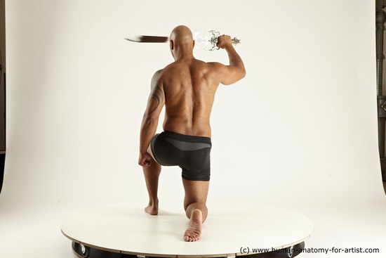 Underwear Fighting with sword Man Black Muscular Bald Multi angles poses Academic
