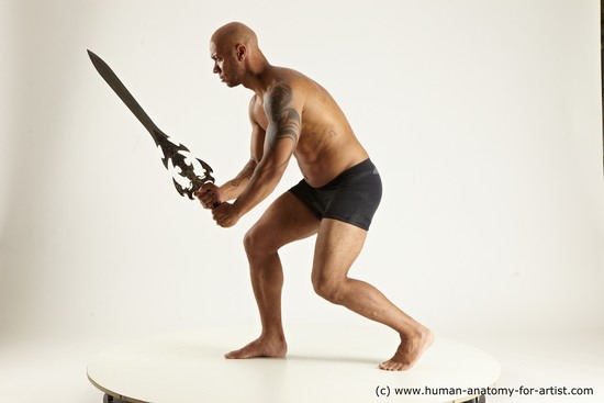 Underwear Fighting with sword Man Black Muscular Bald Multi angles poses Academic