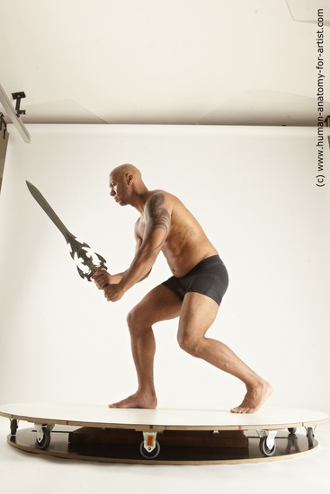 Underwear Fighting with sword Man Black Muscular Bald Multi angles poses Academic