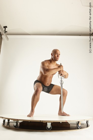 Underwear Fighting with sword Man Black Muscular Bald Multi angles poses Academic