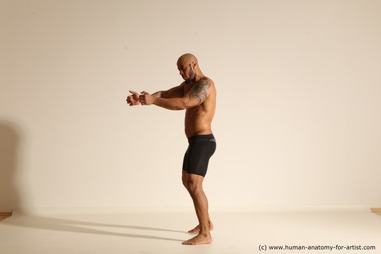 Underwear Man Black Muscular Bald Dancing Dynamic poses Academic