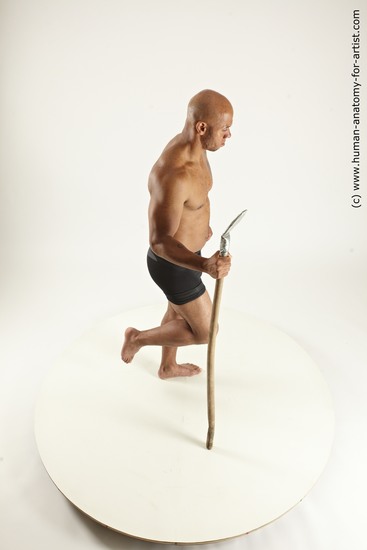 Underwear Fighting with spear Man Black Standing poses - ALL Muscular Bald Standing poses - simple Multi angles poses Academic