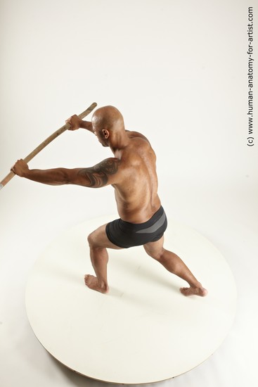 Underwear Fighting with spear Man Black Standing poses - ALL Muscular Bald Standing poses - simple Multi angles poses Academic