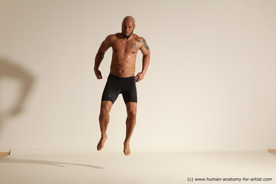 Underwear Man Black Muscular Bald Dynamic poses Academic