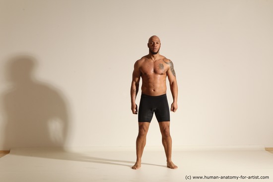 Underwear Man Black Muscular Bald Dynamic poses Academic