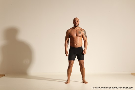 Underwear Man Black Muscular Bald Dynamic poses Academic