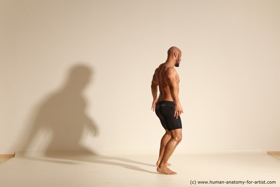 Underwear Man Black Muscular Bald Dynamic poses Academic