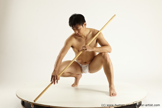 Underwear Fighting with spear Man Asian Multi angles poses Academic