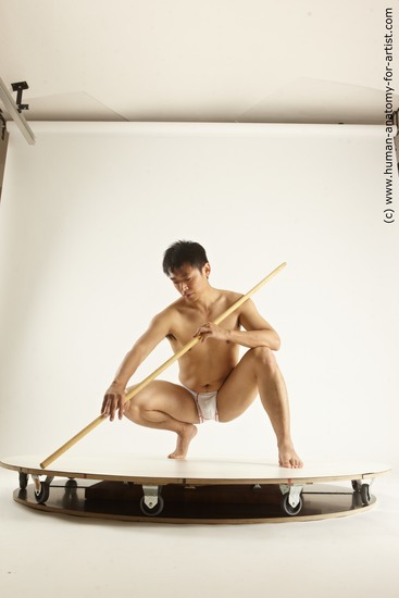 Underwear Fighting with spear Man Asian Multi angles poses Academic