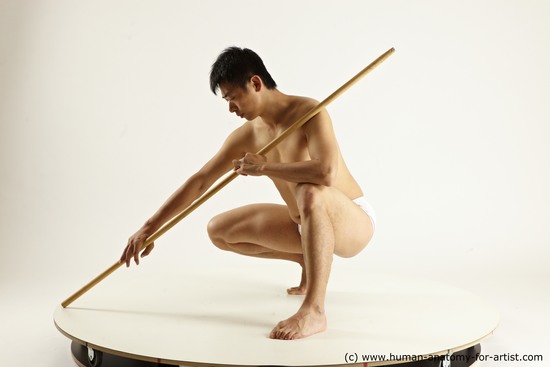 Underwear Fighting with spear Man Asian Multi angles poses Academic