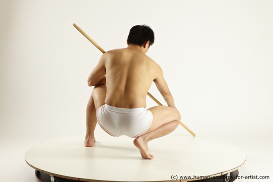 Underwear Fighting with spear Man Asian Multi angles poses Academic