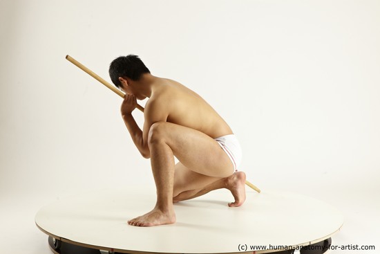 Underwear Fighting with spear Man Asian Multi angles poses Academic