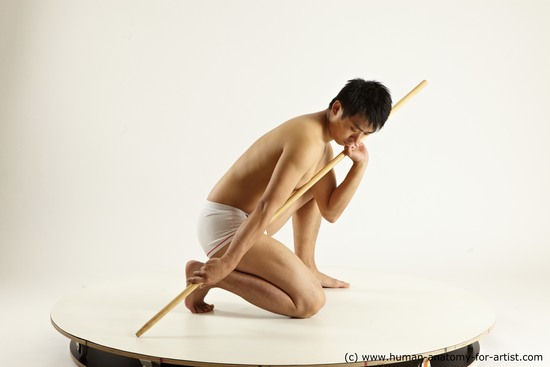 Underwear Fighting with spear Man Asian Multi angles poses Academic