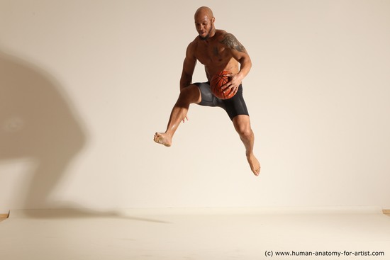 Underwear Man Black Muscular Bald Dynamic poses Academic