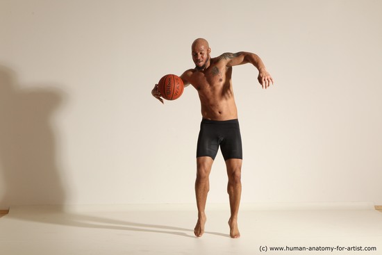 Underwear Man Black Muscular Bald Dynamic poses Academic