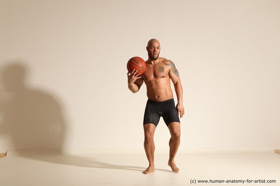 Underwear Man Black Muscular Bald Dynamic poses Academic