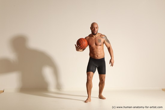 Underwear Man Black Muscular Bald Dynamic poses Academic