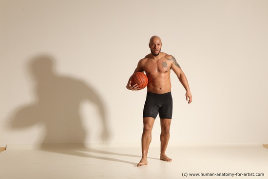 Underwear Man Black Muscular Bald Dynamic poses Academic