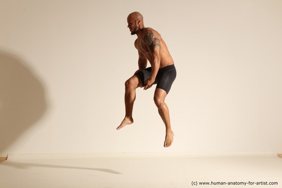 Underwear Man Black Muscular Bald Dynamic poses Academic