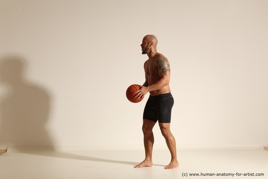 Underwear Man Black Muscular Bald Dynamic poses Academic