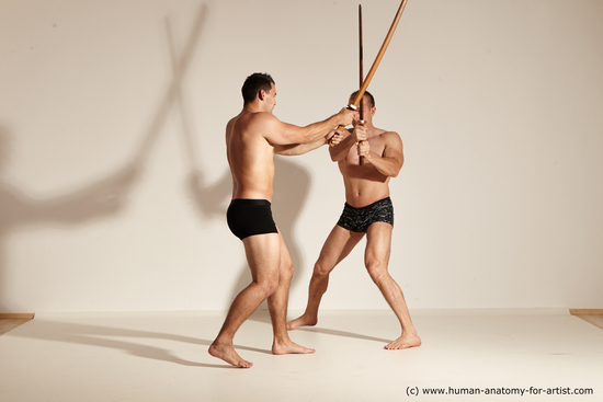 Underwear Fighting with spear Man - Man White Athletic Short Brown Dynamic poses Academic