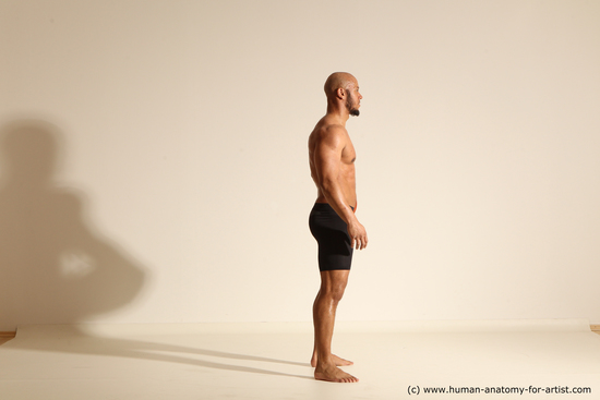 Underwear Man Black Muscular Bald Dynamic poses Academic