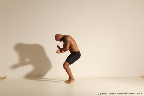 Underwear Man Black Muscular Bald Dancing Dynamic poses Academic