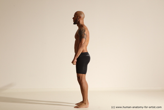 Underwear Man Black Muscular Bald Dancing Dynamic poses Academic