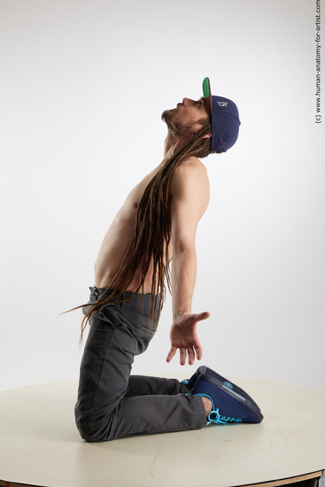 Casual Man White Kneeling poses - ALL Slim Brown Kneeling poses - on both knees Dreadlocks Standard Photoshoot Academic