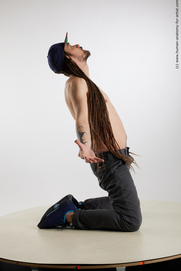 Casual Man White Kneeling poses - ALL Slim Brown Kneeling poses - on both knees Dreadlocks Standard Photoshoot Academic