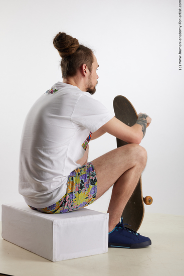 Sportswear Man White Sitting poses - simple Slim Brown Sitting poses - ALL Dreadlocks Standard Photoshoot Academic
