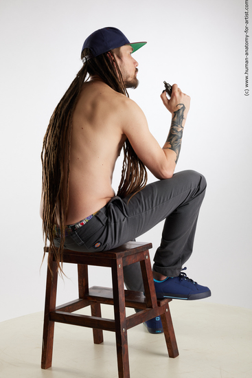 Casual Man White Sitting poses - simple Slim Brown Sitting poses - ALL Dreadlocks Standard Photoshoot Academic