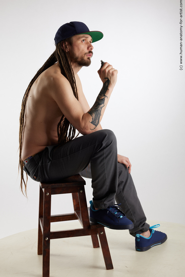 Casual Man White Sitting poses - simple Slim Brown Sitting poses - ALL Dreadlocks Standard Photoshoot Academic