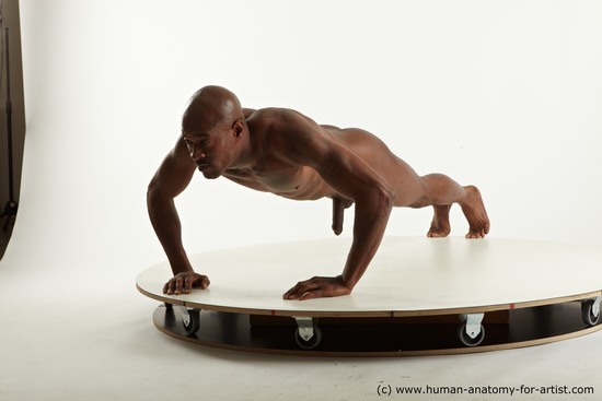 Nude Man Black Laying poses - ALL Slim Bald Laying poses - on stomach Standard Photoshoot Realistic