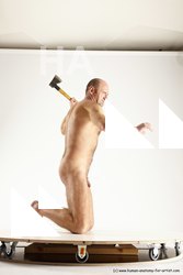 Nude Fighting with axe Man White Kneeling poses - ALL Average Short Grey Kneeling poses - on both knees Multi angles poses Realistic Fighting poses - ALL
