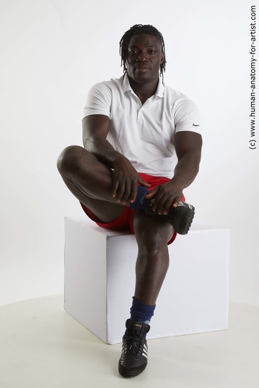 Sportswear Man Black Sitting poses - simple Muscular Black Sitting poses - ALL Dreadlocks Standard Photoshoot Academic