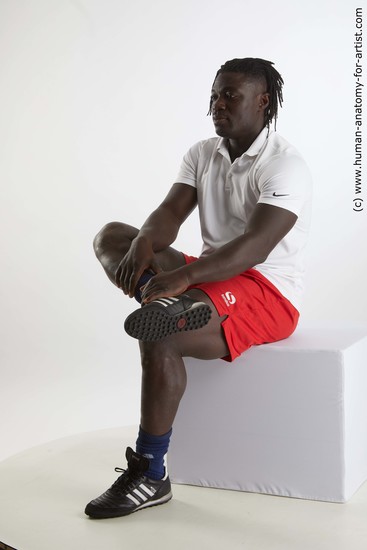 Sportswear Man Black Sitting poses - simple Muscular Black Sitting poses - ALL Dreadlocks Standard Photoshoot Academic