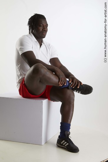 Sportswear Man Black Sitting poses - simple Muscular Black Sitting poses - ALL Dreadlocks Standard Photoshoot Academic