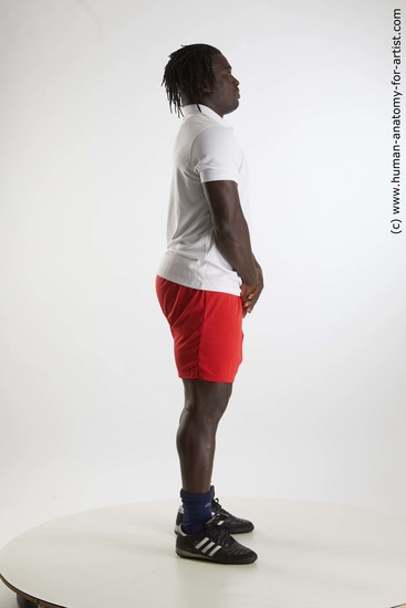 Sportswear Man Black Standing poses - ALL Muscular Black Standing poses - simple Dreadlocks Standard Photoshoot Academic