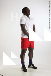 Sportswear Man Black Standing poses - ALL Muscular Black Standing poses - simple Dreadlocks Standard Photoshoot Academic