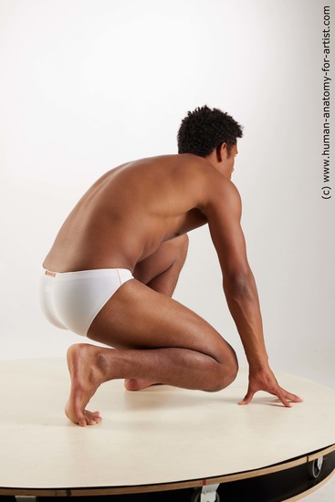 Swimsuit Man Black Kneeling poses - ALL Athletic Short Kneeling poses - on one knee Black Standard Photoshoot Academic