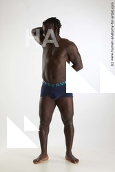 Underwear Man Black Standing poses - ALL Muscular Black Standing poses - simple Dreadlocks Standard Photoshoot Academic