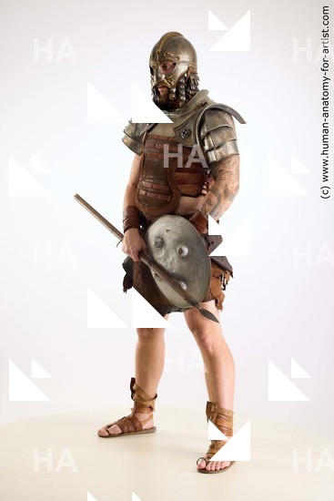 Casual Fighting with sword Man White Sitting poses - simple Muscular Short Brown Sitting poses - ALL Standard Photoshoot Academic Fighting poses - ALL